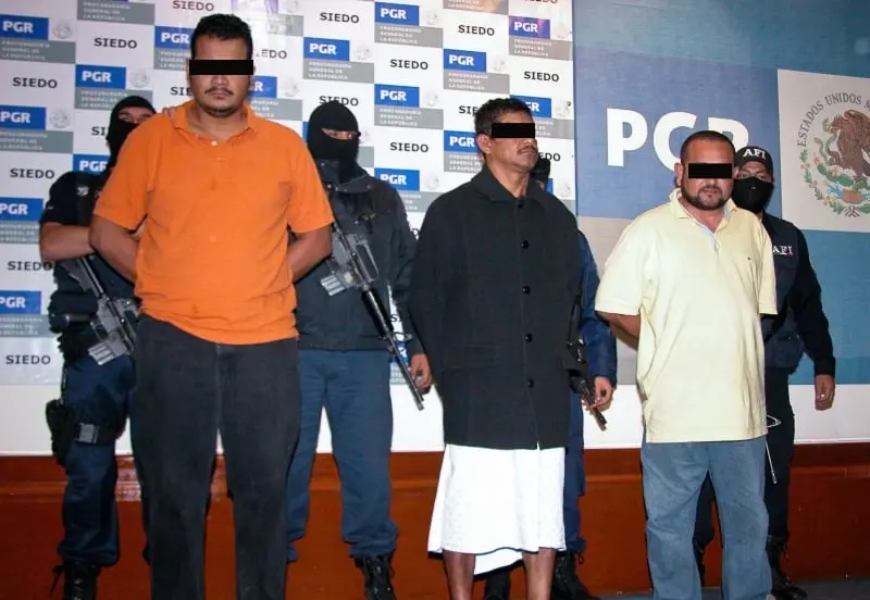 Los tres supuestos implicados cuya confesión fue obtenida bajo tortura (Cuartoscuro)