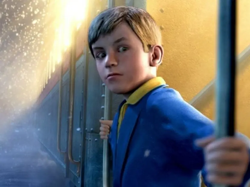 El conductor de un tren guía a un niño que duda de la existencia de Santa Claus al Polo Norte.