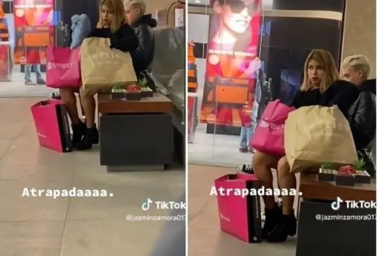 Cachan a mujer cambiando sus compras a bolsa de Liverpool