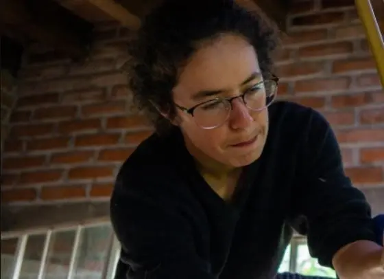 Era la protagonista de la historia, una ni&ntilde;a que vive en familia y desde su div&aacute;n cuenta los problemas que vive en su d&iacute;a a d&iacute;a.