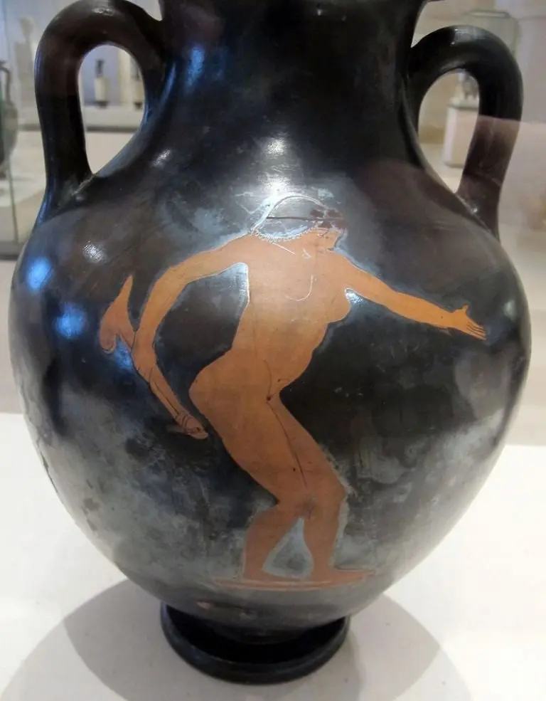 Cerámica griega del siglo V A.C de mujer con un dildo. Foto: Wikimedia.