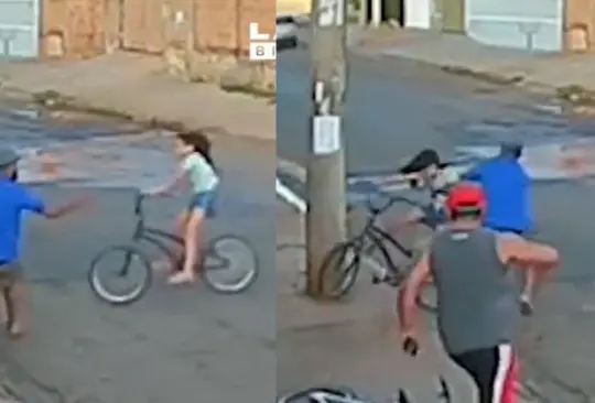 Hombre salva a niña de chocar contra poste. Hombre salva a niña de chocar contra poste.