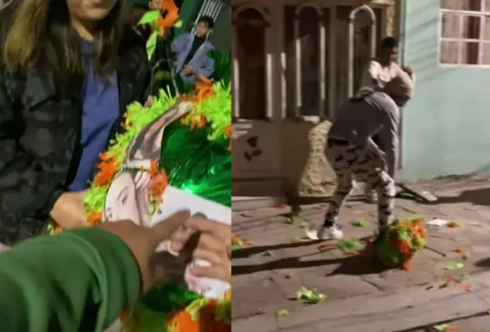 En el video, se ve a una mujer sosteniendo una piñata un tanto particular: estaba decorada con las fotografías de las exparejas que aparentemente habían causado penas al grupo.