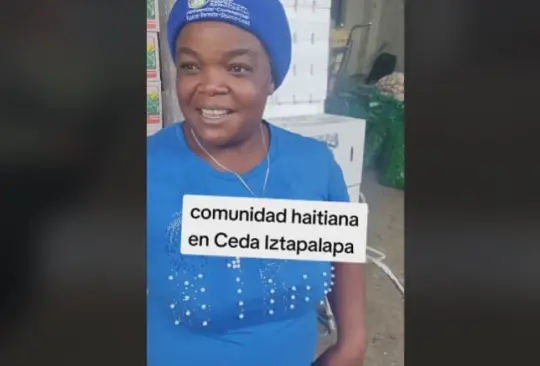 Una mujer perteneciente a la comunidad haitiana muestra sus ganas y disposición para salir adelante.