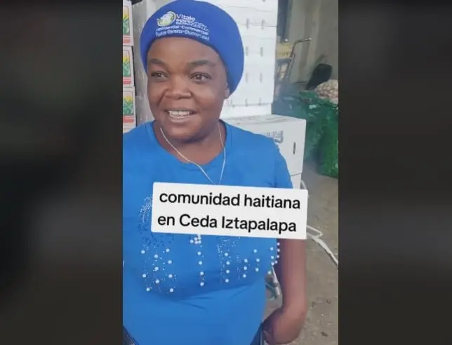 Una mujer perteneciente a la comunidad haitiana muestra sus ganas y disposici&oacute;n para salir adelante.