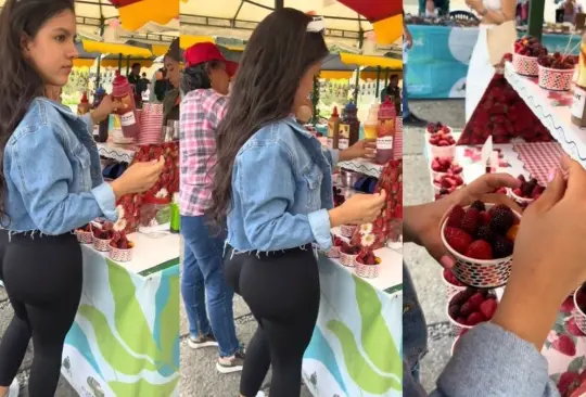 Hermosa vendedora de fresas abre Tik Tok para atraer clientes. 