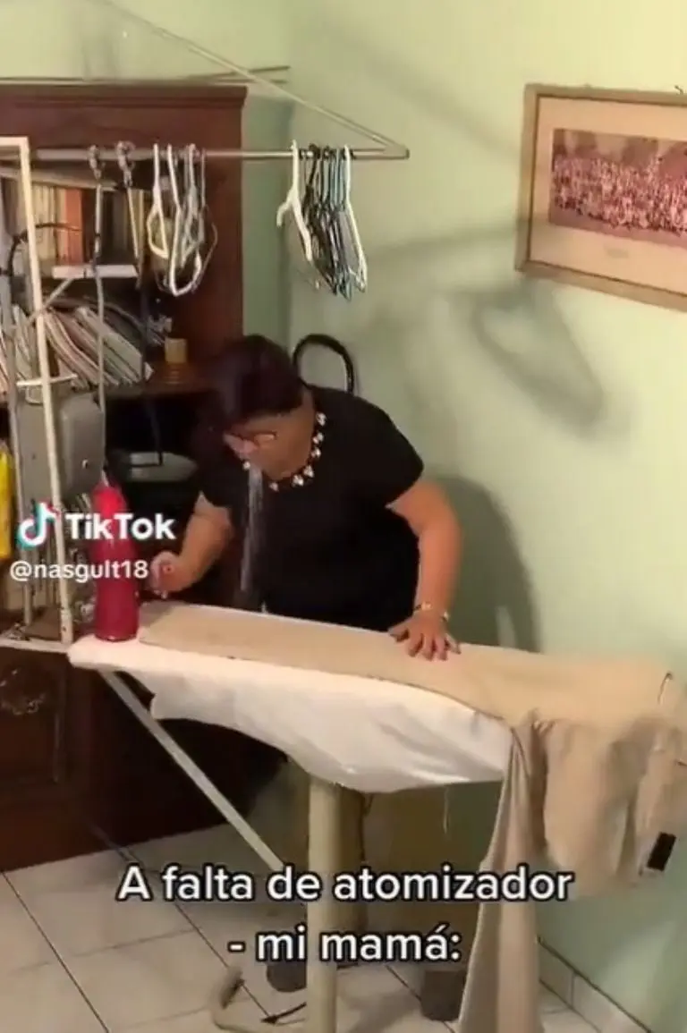 Mamá se hace viral por inusual forma de planchar - Tomada de video