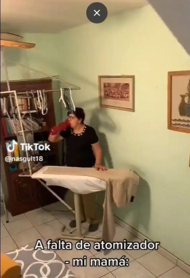 Mamá se hace viral por inusual forma de planchar - Tomada de video