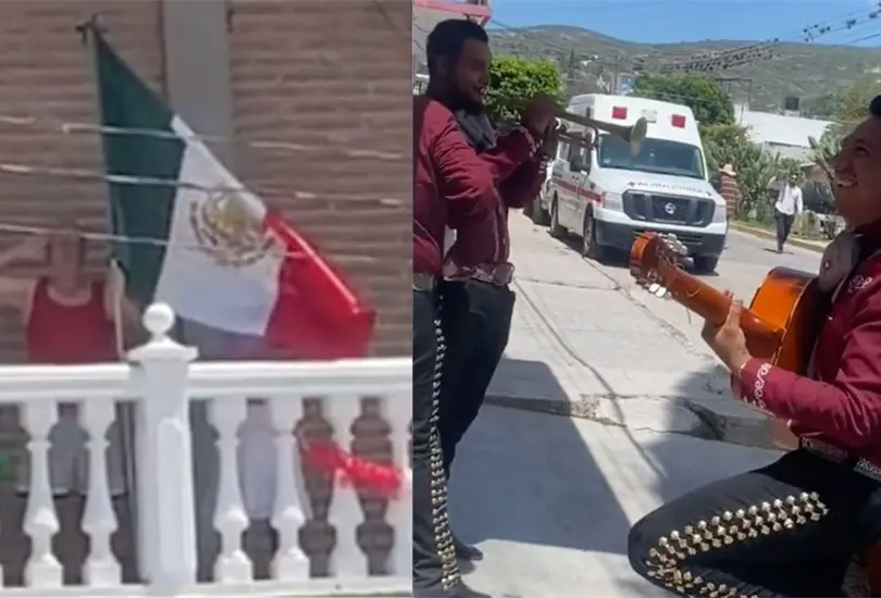 Hombre pone la bandera de M&eacute;xico en su balc&oacute;n y mariachi le toca el himno nacional. 
