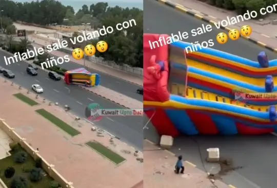 Inflable sale volando hacia carretera con niños a bordo que jugaban en el. 