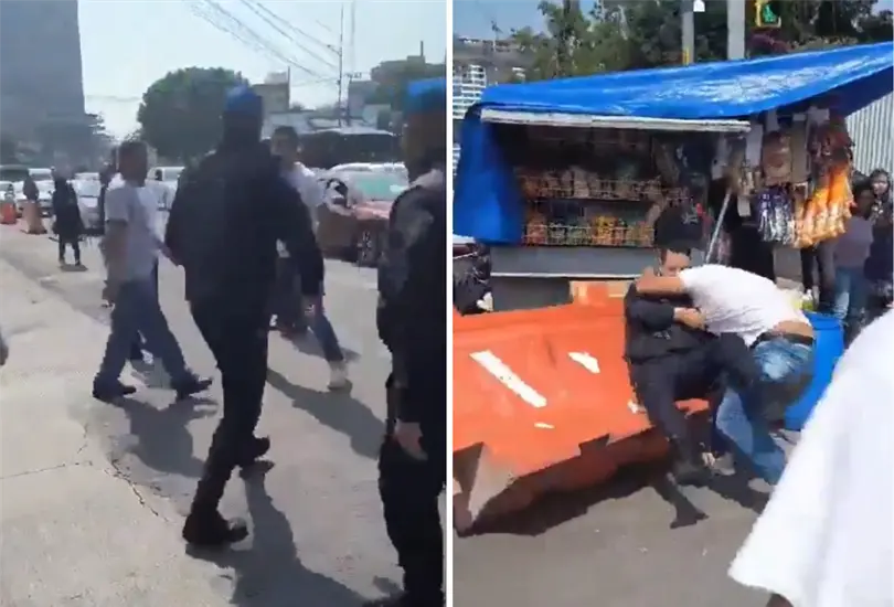 Polic&iacute;a y sujeto pelean en la v&iacute;a p&uacute;blica.
