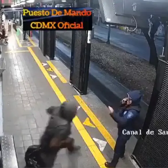 Hombre empuja a policía al carril del Metrobús en Iztapalapa