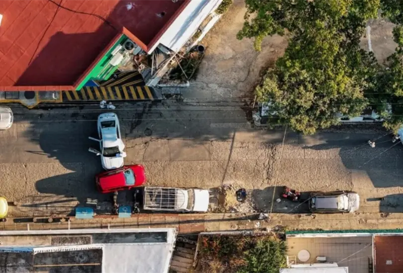 Fotograf&iacute;a a&eacute;rea de peritos forenses en la zona donde mataron al magistrado Edmundo Rom&aacute;n Pinz&oacute;n.