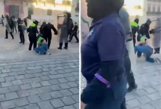 Policías arrastran a mujer por la calle en marcha del 8M. 