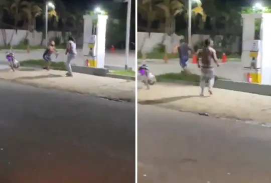 Hombres pelean a machetazos en la calle. 