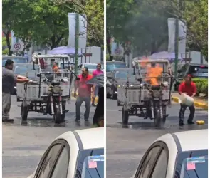 Captan a hombre apagando incendio de motocicleta con una Coca Cola y se hace viral