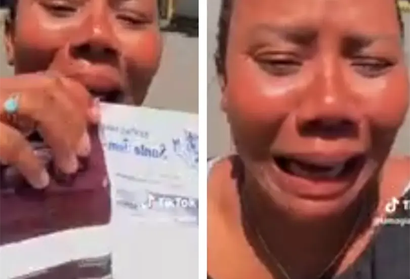La mujer aparece desolada mostrando su ecograf&iacute;a.