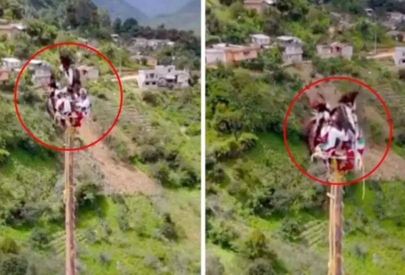 Caporal casi cae en show de voladores de Papantla. Caporal casi cae en show de voladores de Papantla.