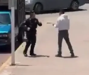 Conductor golpea e intenta atropellar a policía en Calpulalpan, Tlaxcala