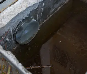 Investigan muerte de mujer con ocho meses de embarazo hallada en la cisterna de su casa