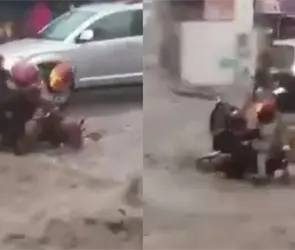 VIDEO: corriente arrastra a familia que viajaba en moto durante intensa lluvia en Ecatepec