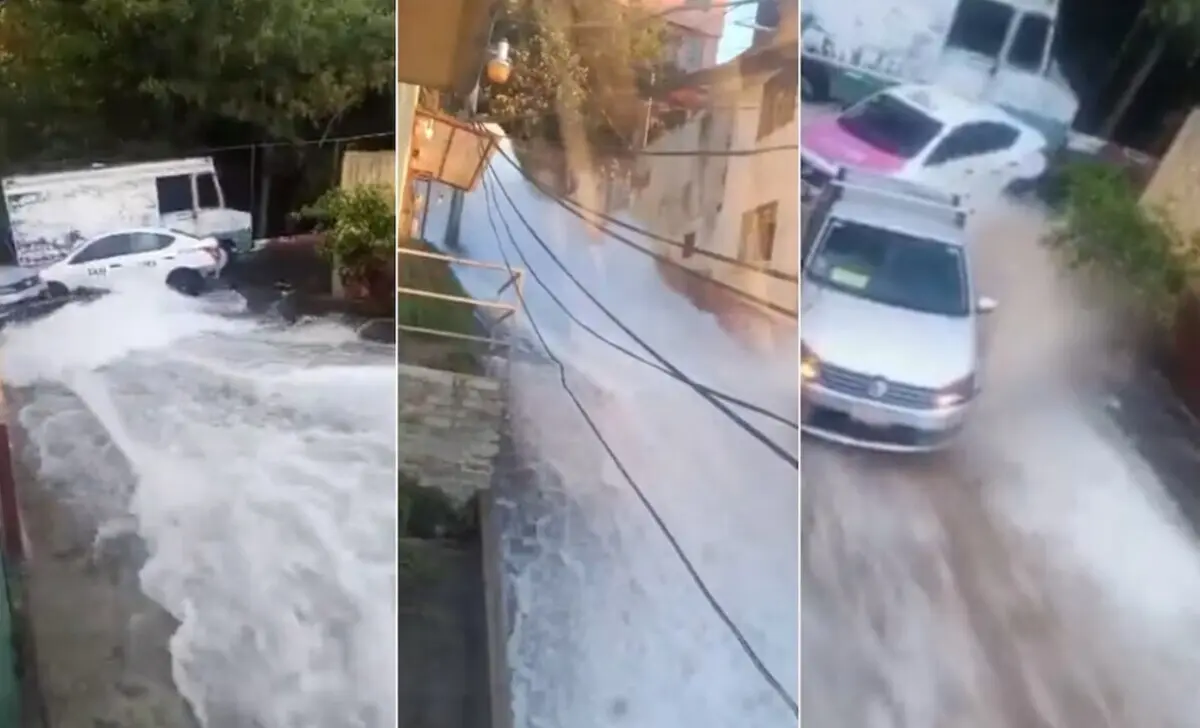  Fuerte corriente de agua inunda calles y viviendas en Torres de Potrero, Álvaro Obregón, tras una megafuga. 