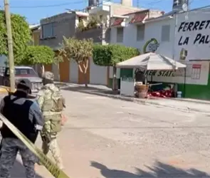Comando armado acribilla a padre e hijo mientras pon&iacute;an su puesto de carnitas