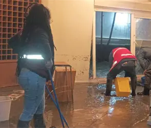 Persona muere ahogada en s&oacute;tano de edificio de lujo tras tormenta en Huixquilucan