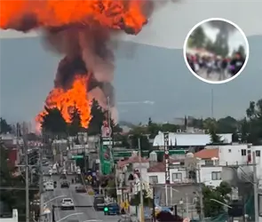 Momento exacto en que evacuan a cientos de alumnos tras explosi&oacute;n de pipa en Puebla