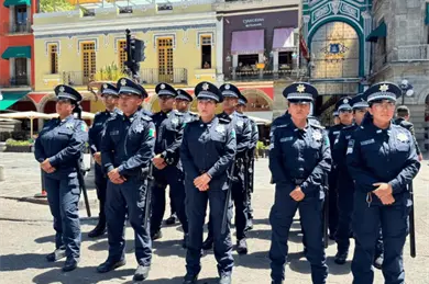 Puebla invita a conocer la historia de su Policía en una exposición fotográfica Puebla invita a conocer la historia de su Policía en una exposición fotográfica