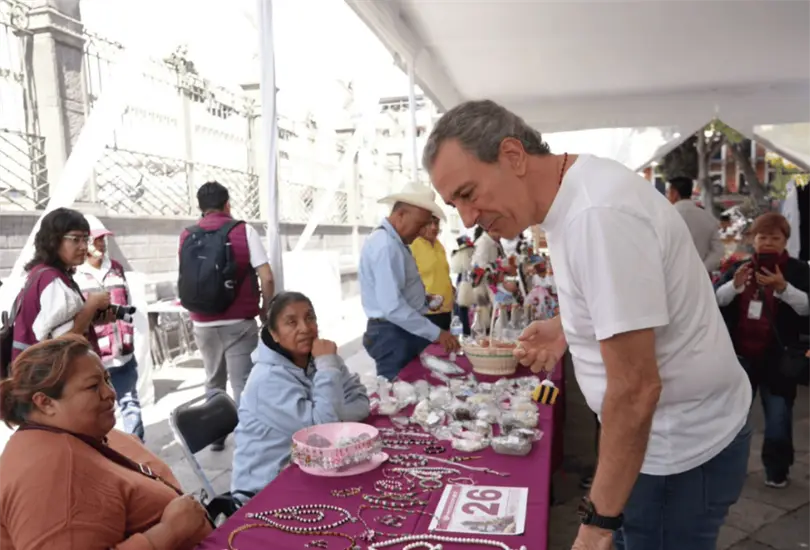 El programa incluyó exposiciones y presentaciones relacionadas con la historia migratoria, el patrimonio cultural, la participación de jóvenes y la gastronomía poblana.