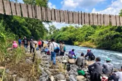 Tres trabajadores de Citrofrut caen a río tras colapso de puente Tres trabajadores de Citrofrut caen a río tras colapso de puente